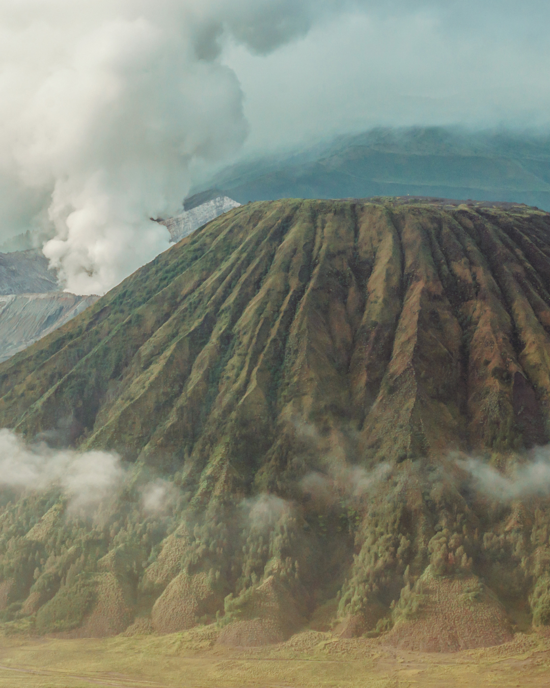Mount Bromo — volcanic landscape with rising steam
